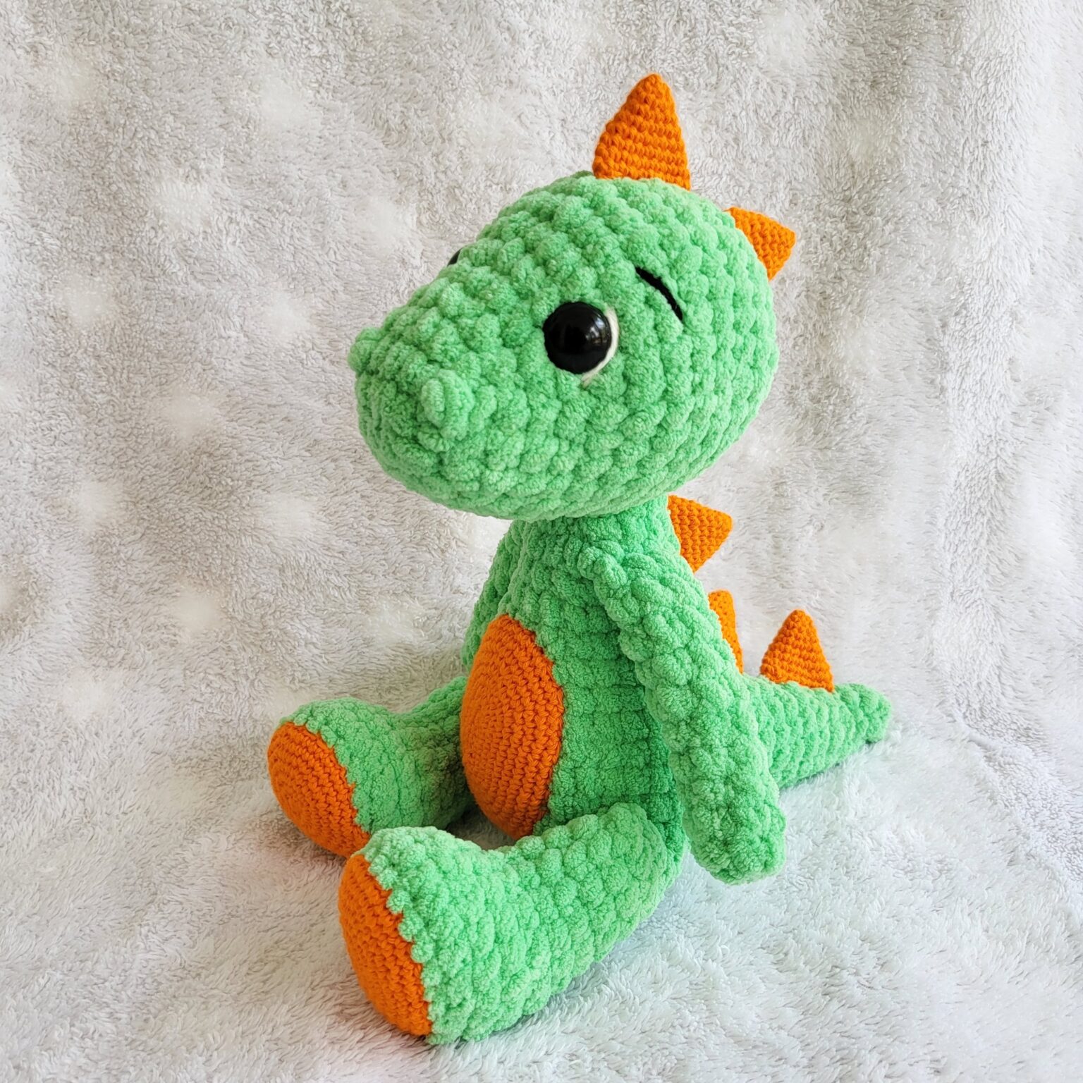 Crochet amigurumi dinosaur plushie