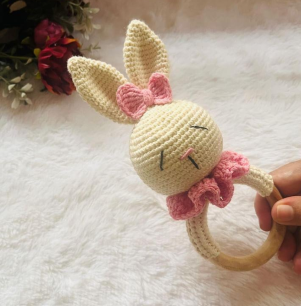 bunny rattle with pink ruffles