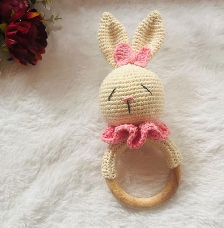 bunny rattle with pink ruffles