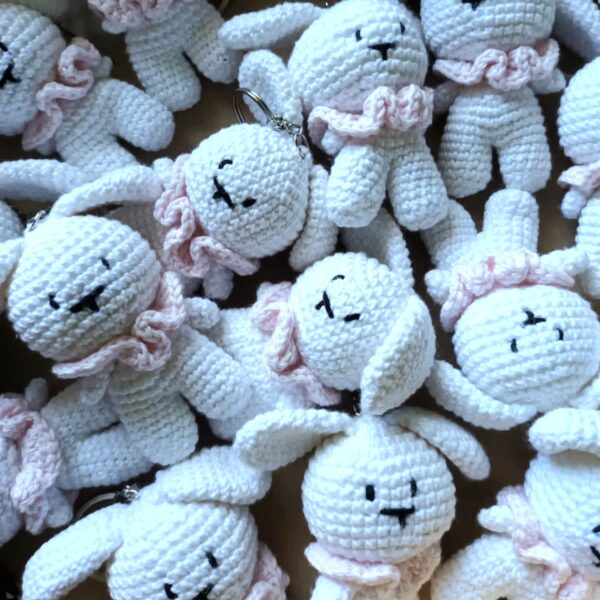 Crochet amigurumi bunny with pink collar keychains