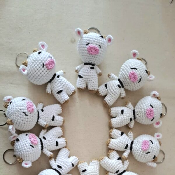 Crochet amigurumi cow keychains