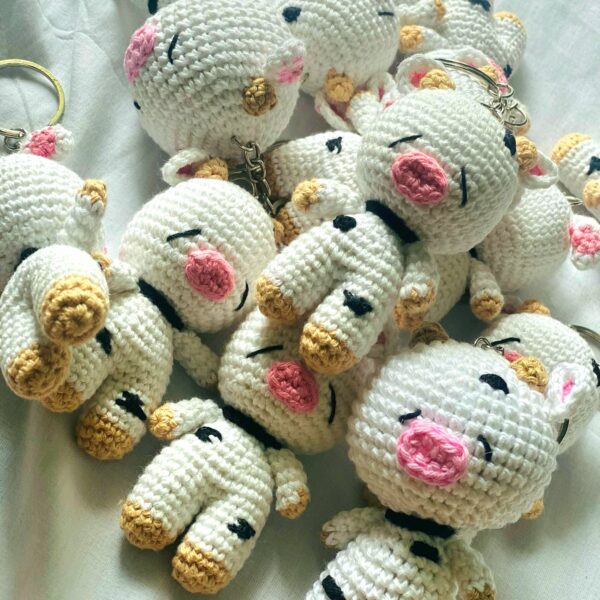 Crochet amigurumi cow keychains