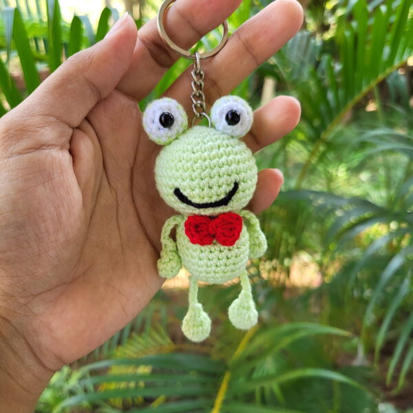 Crochet amigurumi frog with red collar tie keychain full view