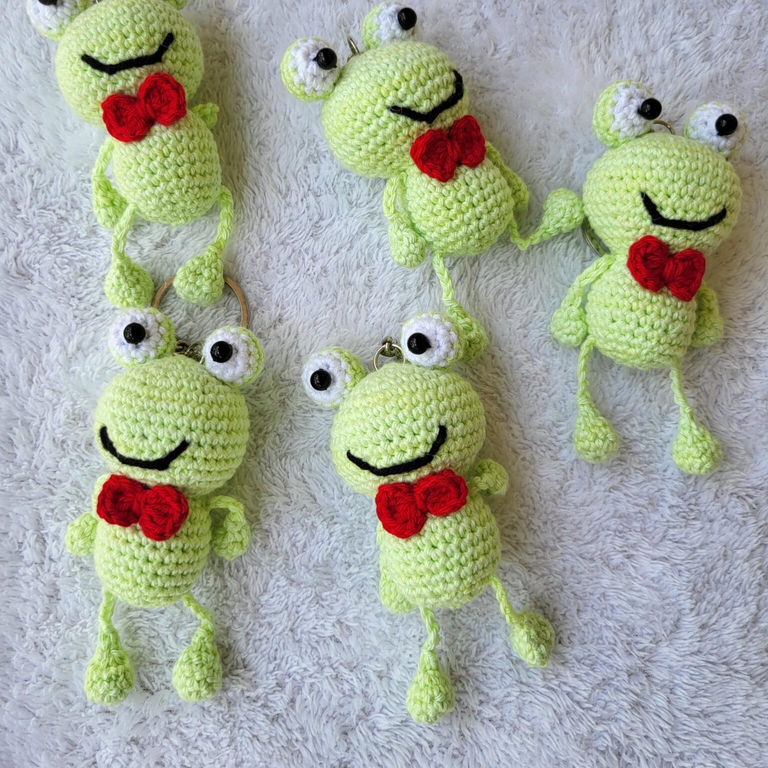 Crochet amigurumi frog with red collar tie keychain