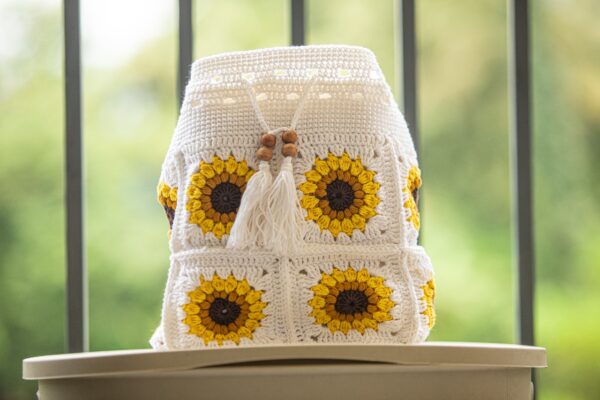 off white sunflower granny square drawstring bag