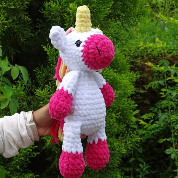 Crochet amigurumi handmade unicorn plushie in pink and white combination